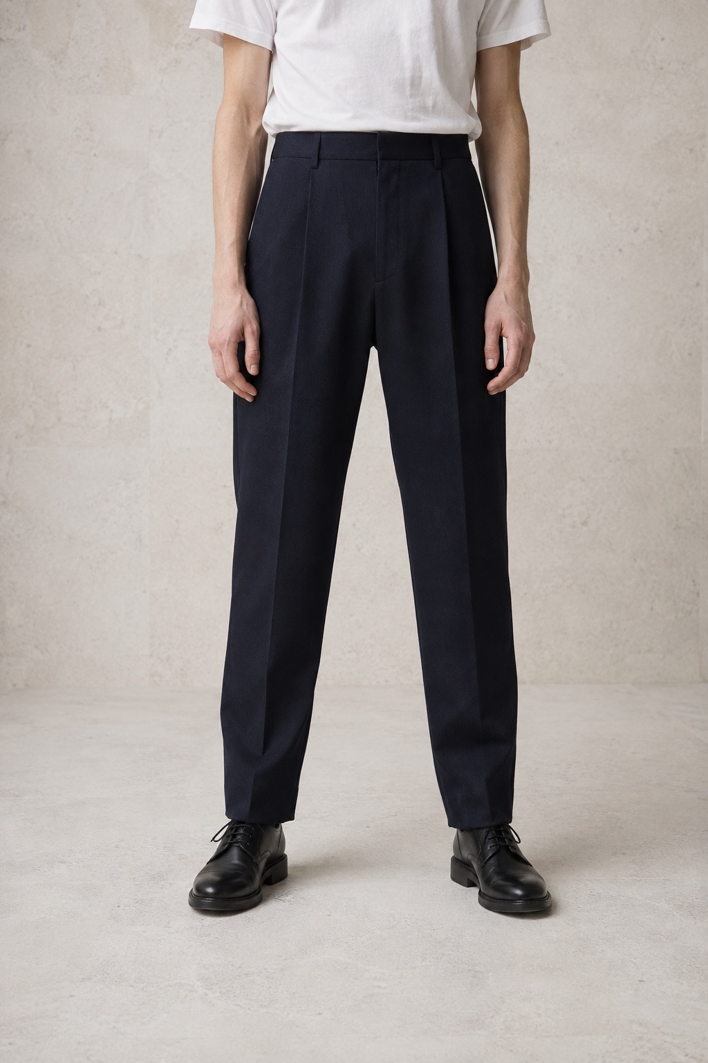 Navy wool trousers with a gentle taper