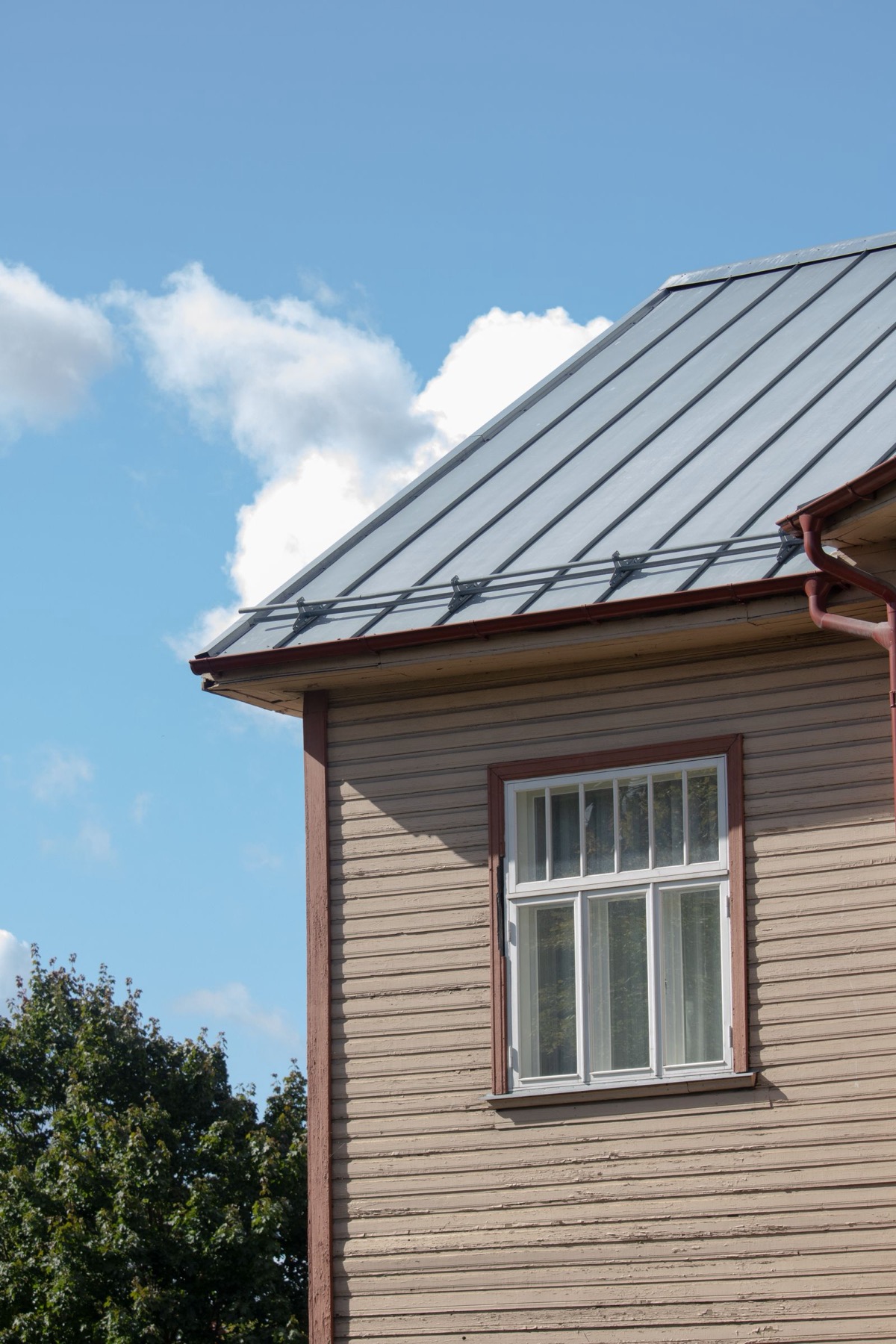 Close view of standing-seam metal roofing panels